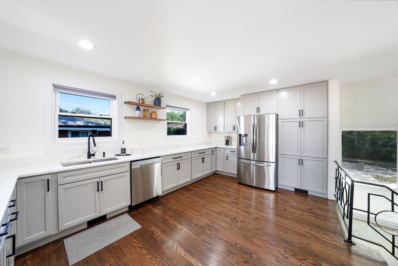 12801 South Ridgeland Avenue Palos Heights, IL 60463 - Photo 15 of 59 a large kitchen with a refrigerator and a sink