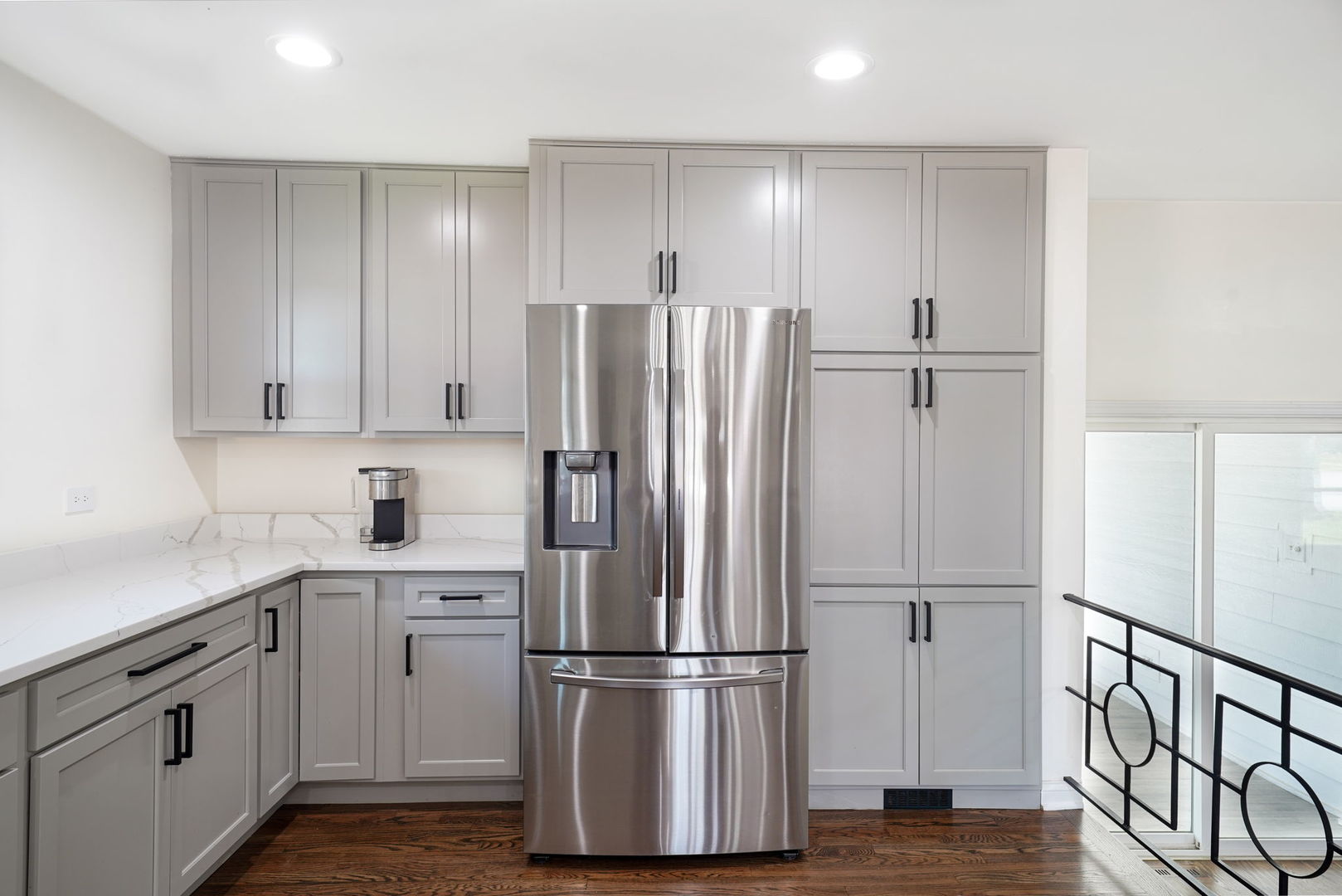 12801 South Ridgeland Avenue Palos Heights, IL 60463 - Photo 18 of 59 a kitchen with stainless steel appliances a refrigerator sink and cabinets