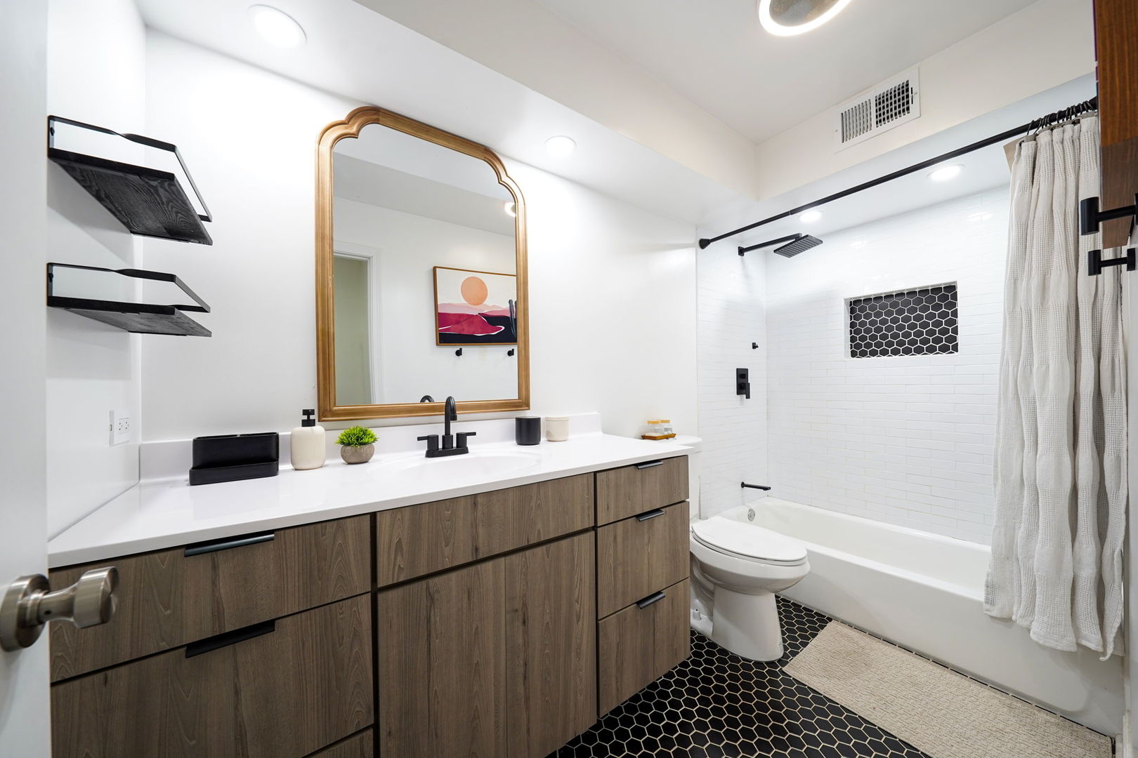 12801 South Ridgeland Avenue Palos Heights, IL 60463 - Photo 37 of 59 a bathroom with a sink a toilet and shower