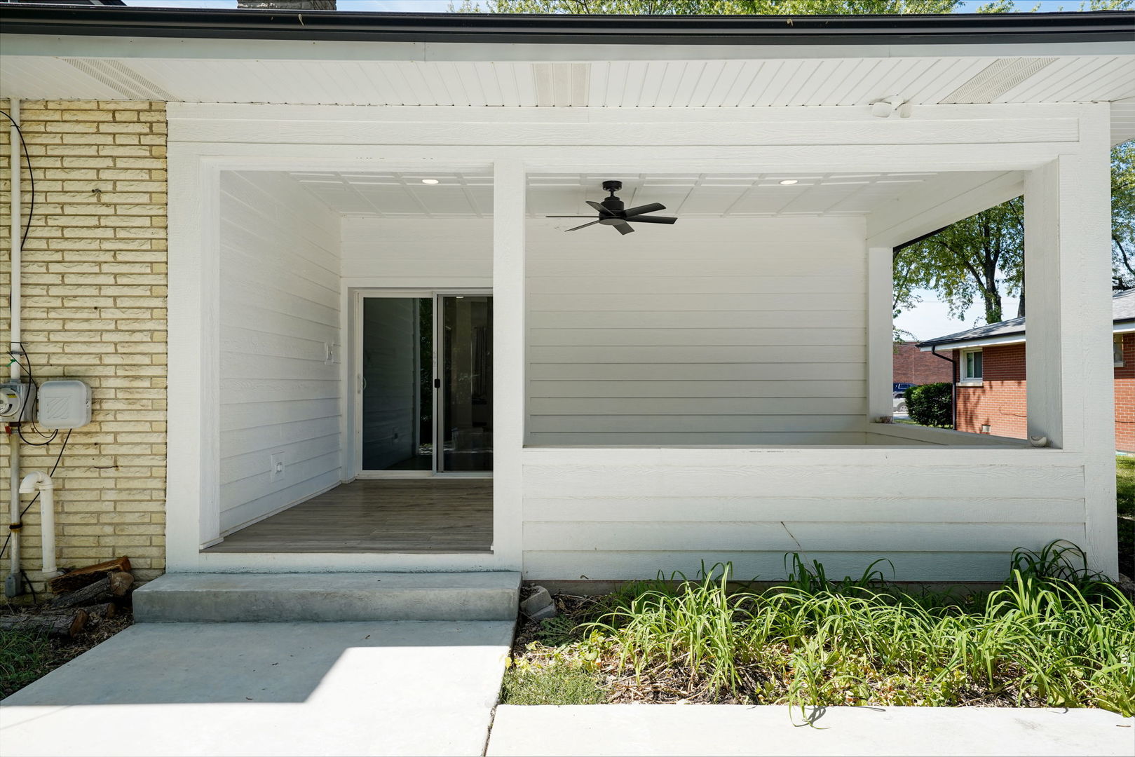 12801 South Ridgeland Avenue Palos Heights, IL 60463 - Photo 41 of 59 a front view of a house with a yard