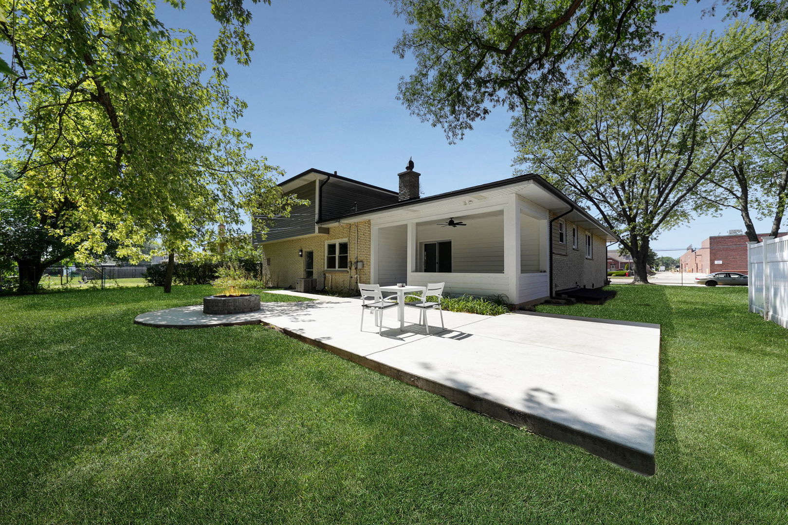 12801 South Ridgeland Avenue Palos Heights, IL 60463 - Photo 48 of 59 a front view of house with a garden and patio