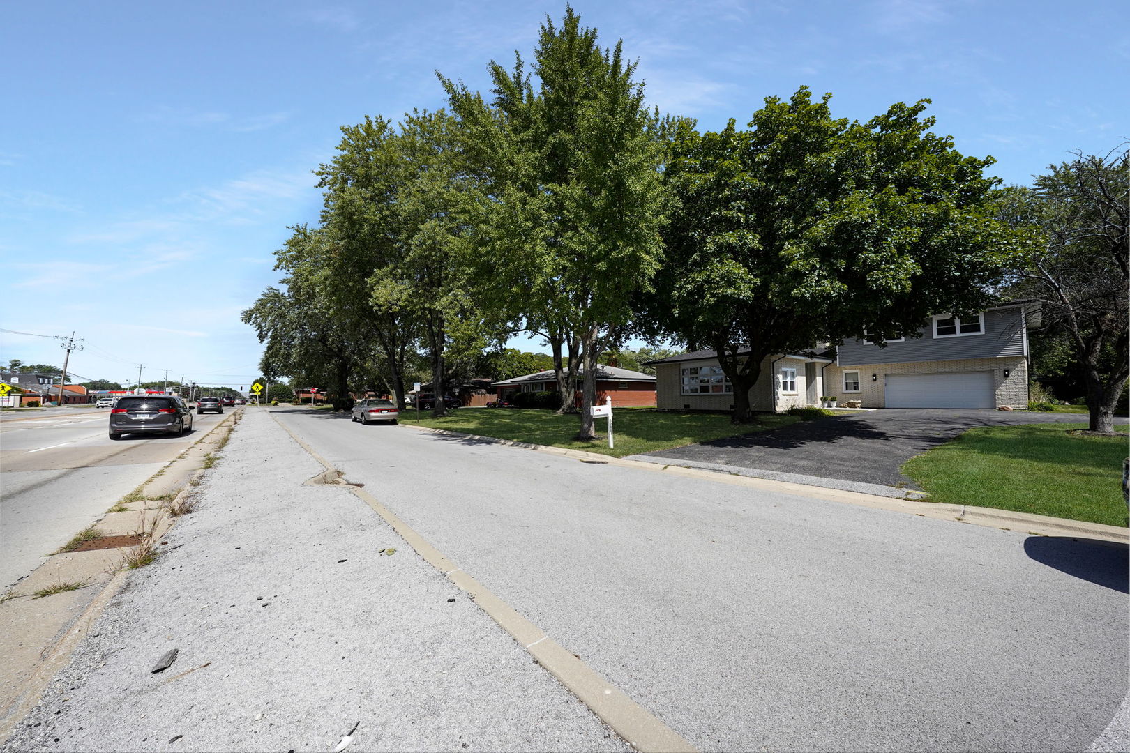 12801 South Ridgeland Avenue Palos Heights, IL 60463 - Photo 50 of 59 a view of street with parked cars