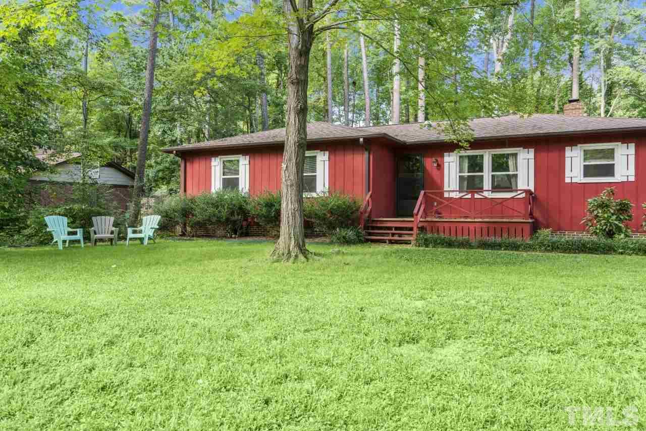 1205 Keith Drive Cary, NC 27511 - Photo 2 of 29 a front view of a house with garden