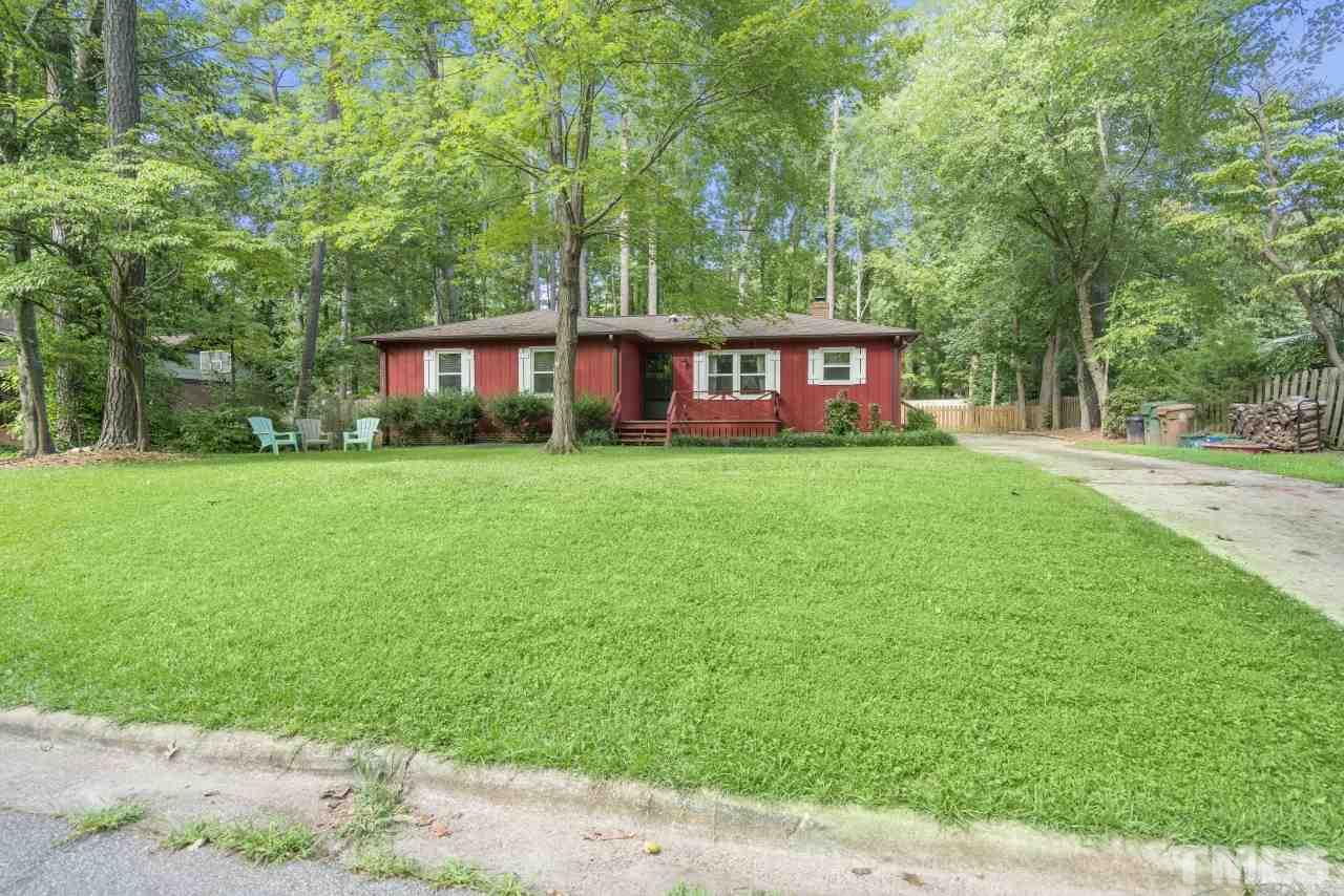 1205 Keith Drive Cary, NC 27511 - Photo 3 of 29 a view of a yard in front of a house