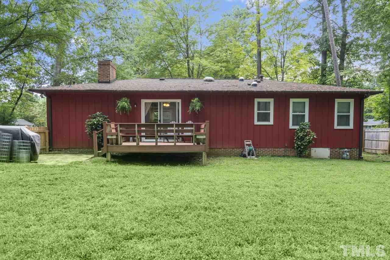 1205 Keith Drive Cary, NC 27511 - Photo 4 of 29 a house view with a garden space