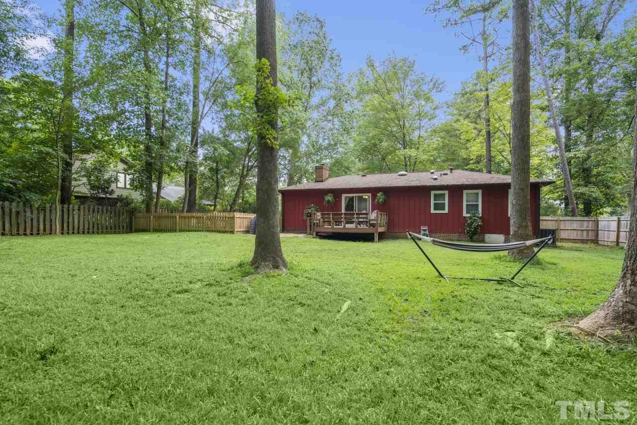 1205 Keith Drive Cary, NC 27511 - Photo 5 of 29 a view of house with backyard space and deck