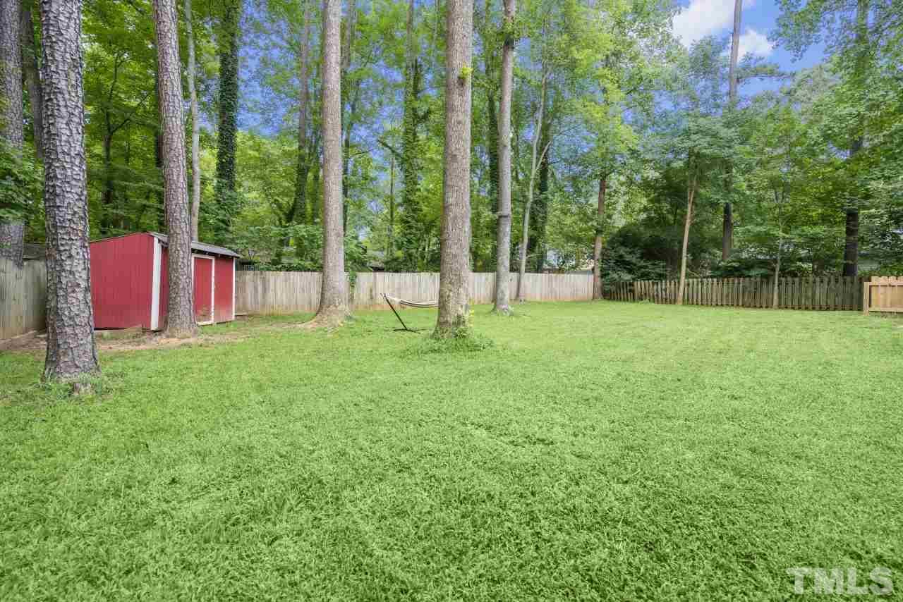 1205 Keith Drive Cary, NC 27511 - Photo 6 of 29 a view of pool with a backyard