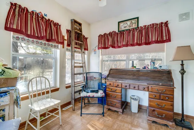 a bathroom with a bathtub toilet and shower