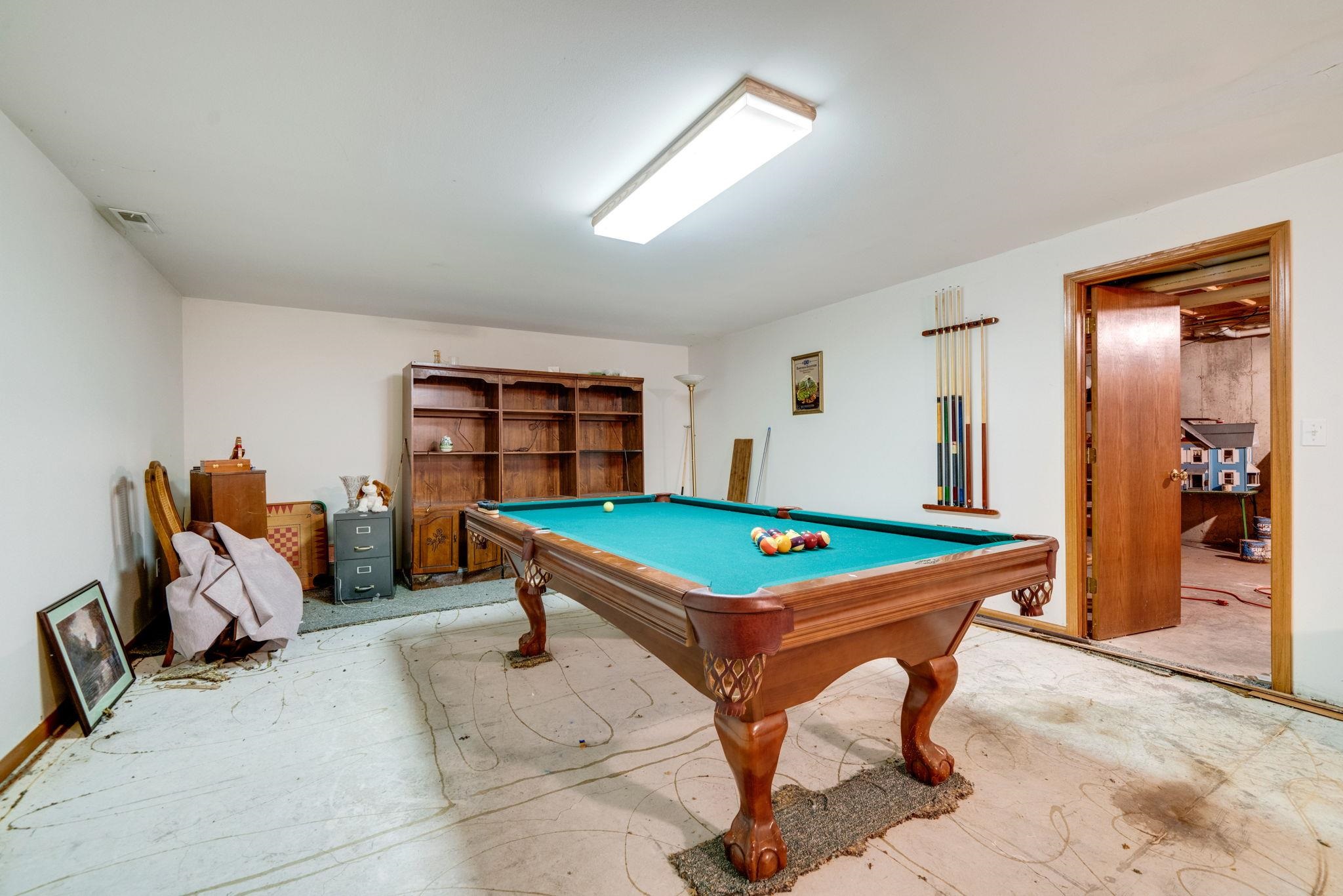 3734 Renfro Road Cherry Valley, IL 61016 - Photo 24 of 39 a room with furniture pool table and window