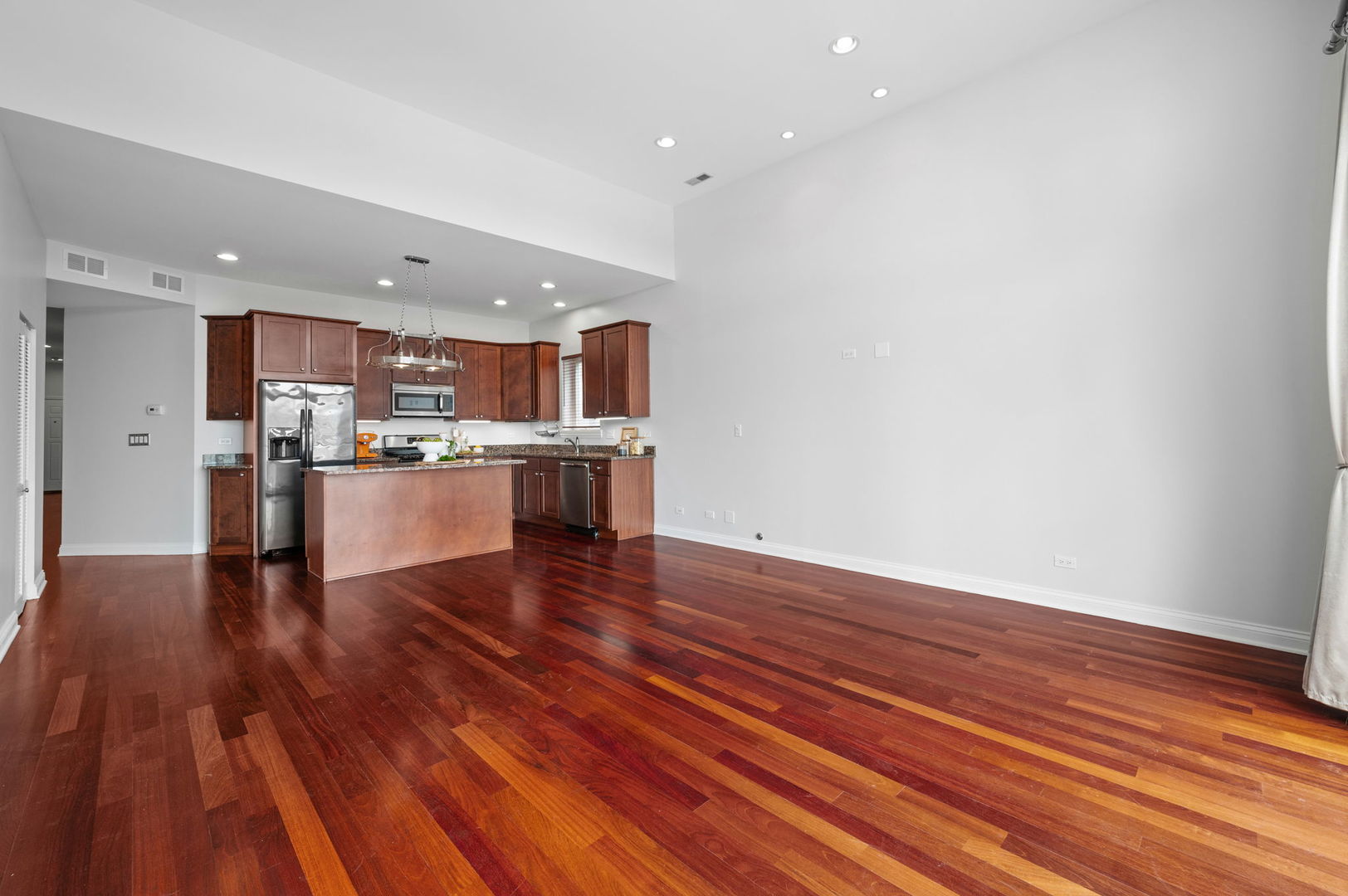2847 North Pulaski Road, Unit 3S Chicago, IL 60641 - Photo 5 of 25 a view of kitchen with wooden floor and electronic appliances