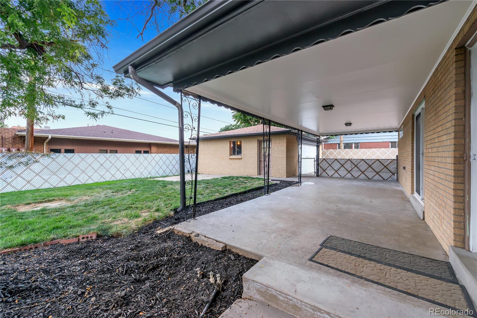 3880 Allison Street Wheat Ridge, CO 80033 - Photo 25 of 25 a view of backyard with green space