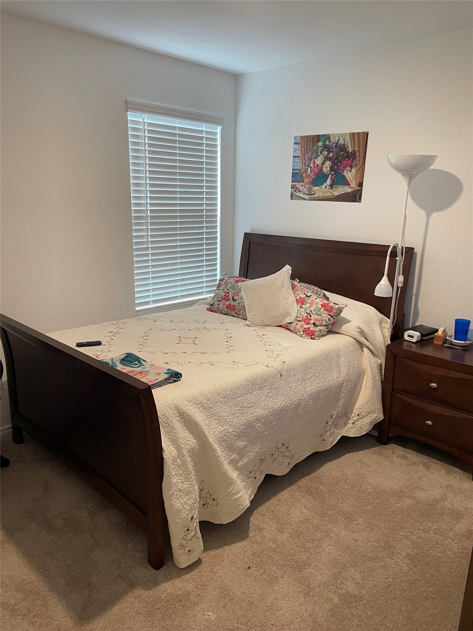 580 Rancho Del Cielo Loop Jarrell, TX 76537 - Photo 14 of 27 a bedroom with a bed dresser and a window
