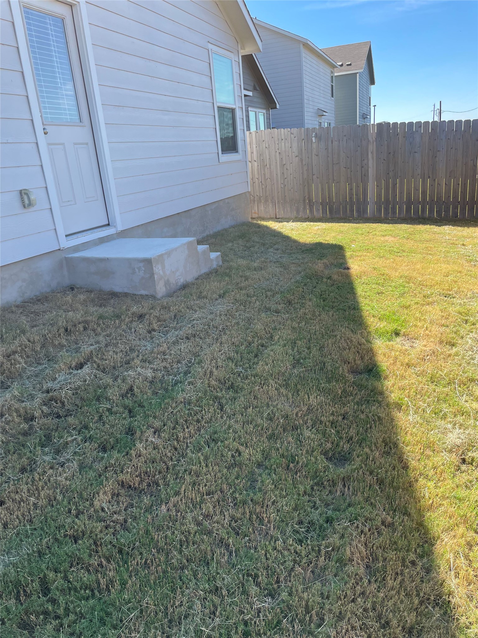 580 Rancho Del Cielo Loop Jarrell, TX 76537 - Photo 20 of 27 a view of a backyard