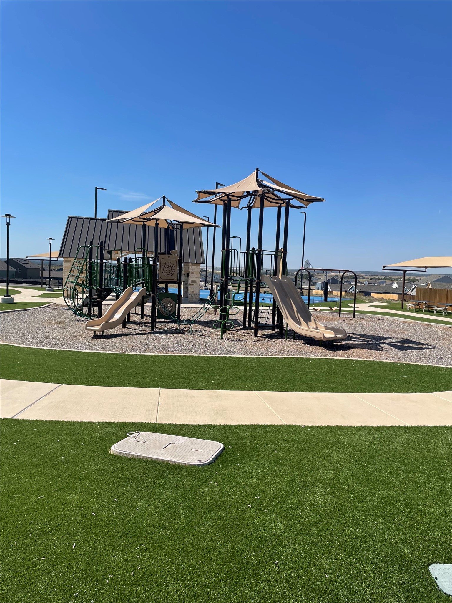 580 Rancho Del Cielo Loop Jarrell, TX 76537 - Photo 26 of 27 a view of a park with slide
