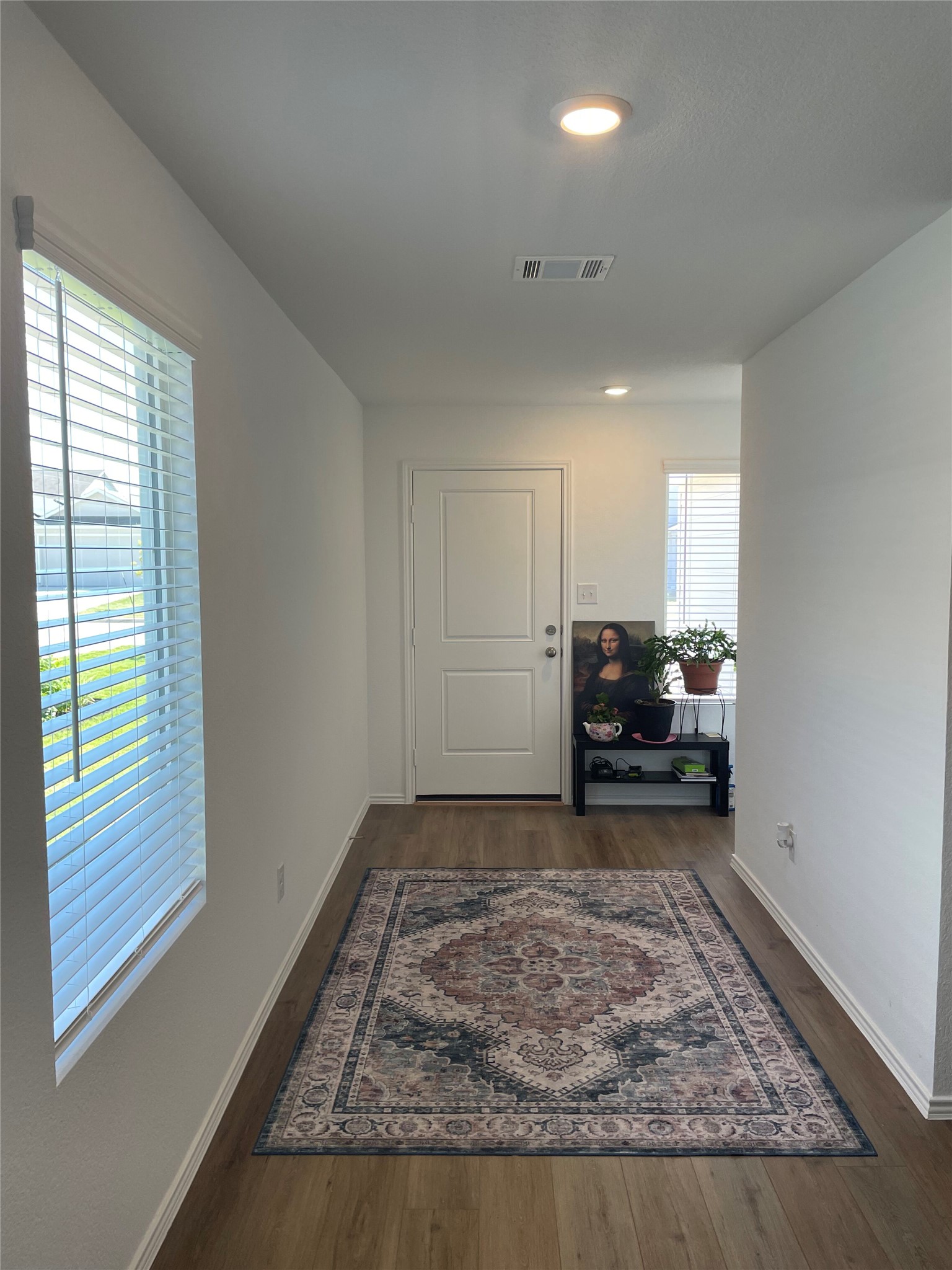 580 Rancho Del Cielo Loop Jarrell, TX 76537 - Photo 3 of 27 a view of a livingroom and a kitchen