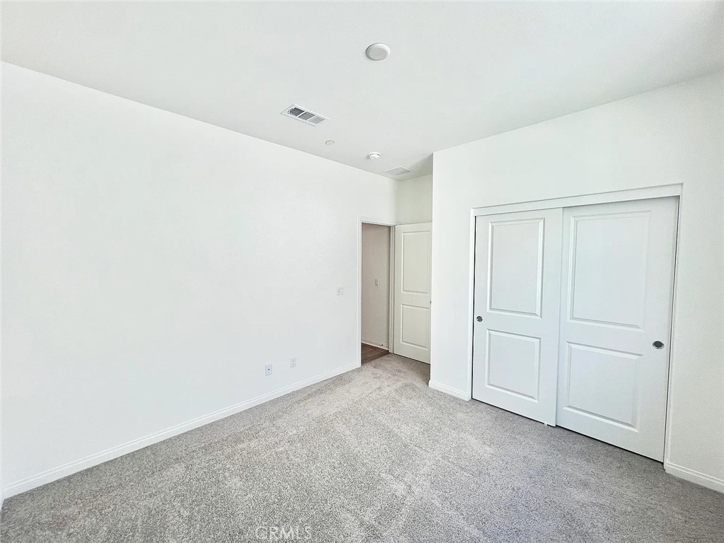 8285 Tristan Lane Riverside, CA 92507 - Photo 23 of 38 a view of an empty room