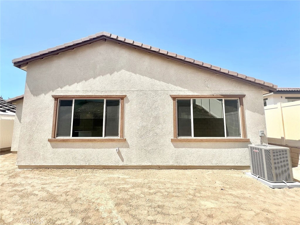 8285 Tristan Lane Riverside, CA 92507 - Photo 37 of 38 a view of house with yard