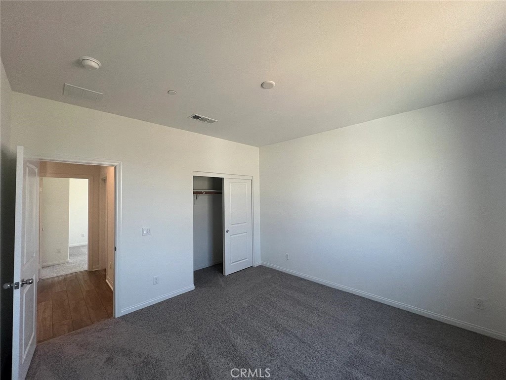 8285 Tristan Lane Riverside, CA 92507 - Photo 38 of 38 an empty room with an entryway