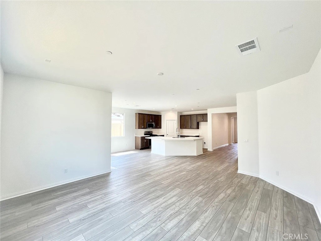 8285 Tristan Lane Riverside, CA 92507 - Photo 5 of 38 a view of a livingroom with a flat screen tv