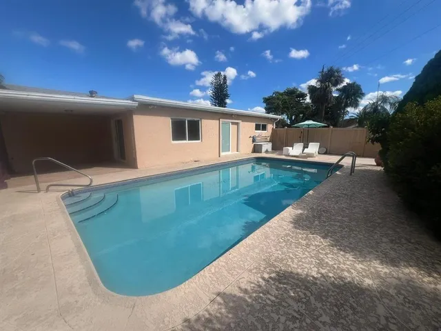 a view of a house with pool