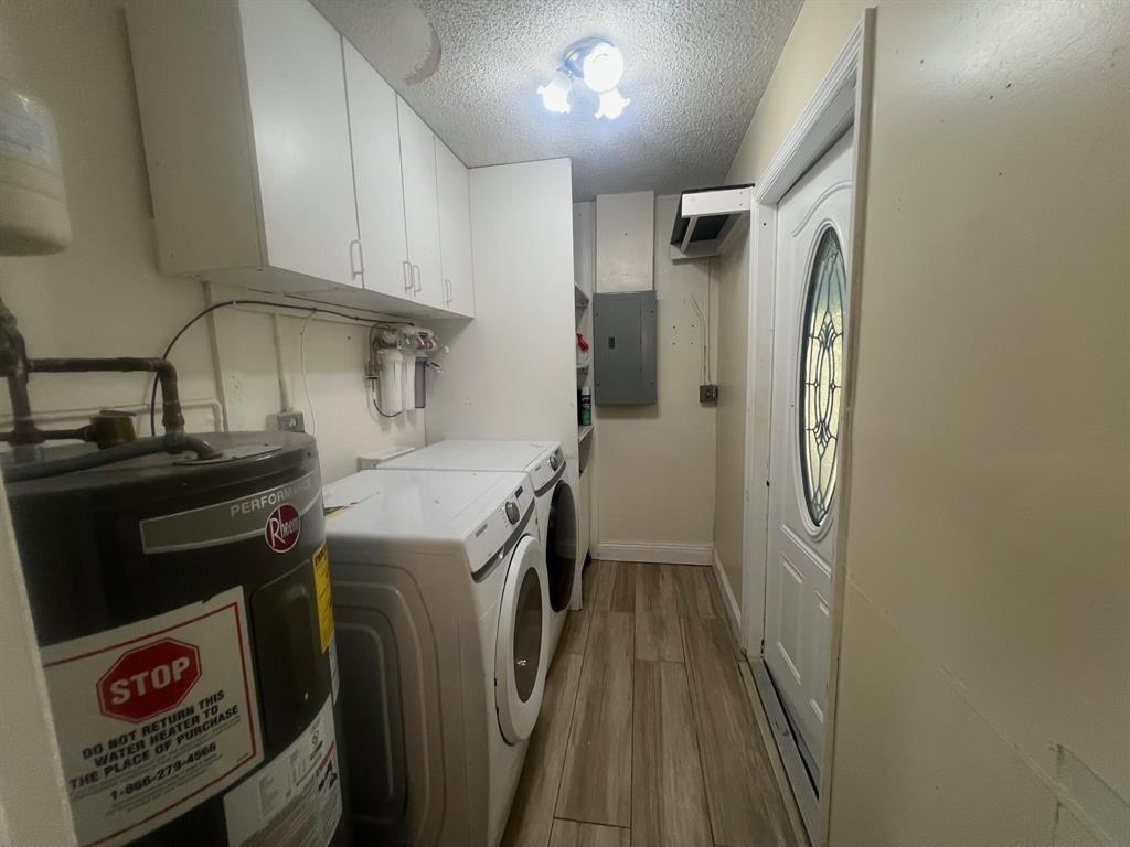 861 Southwest 55th Way Margate, FL 33068 - Photo 36 of 45 a utility room with dryer and washer