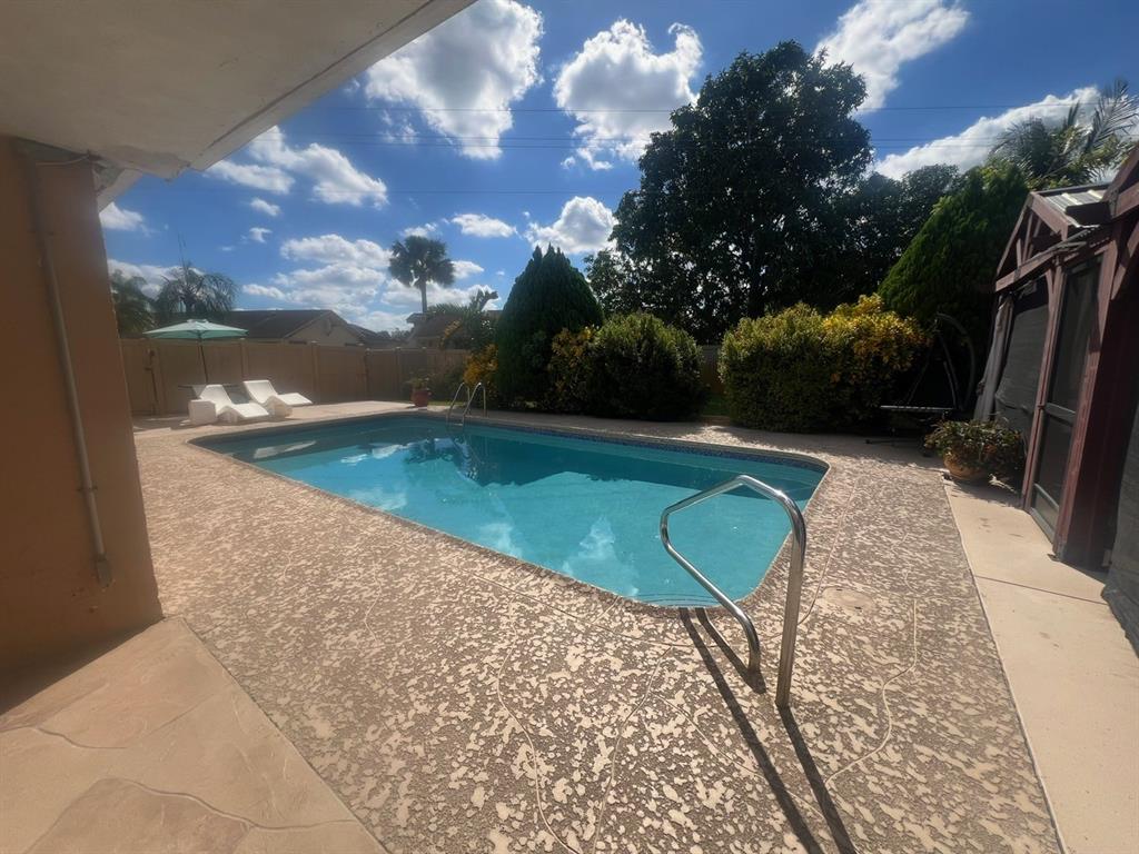 861 Southwest 55th Way Margate, FL 33068 - Photo 6 of 45 a view of a backyard