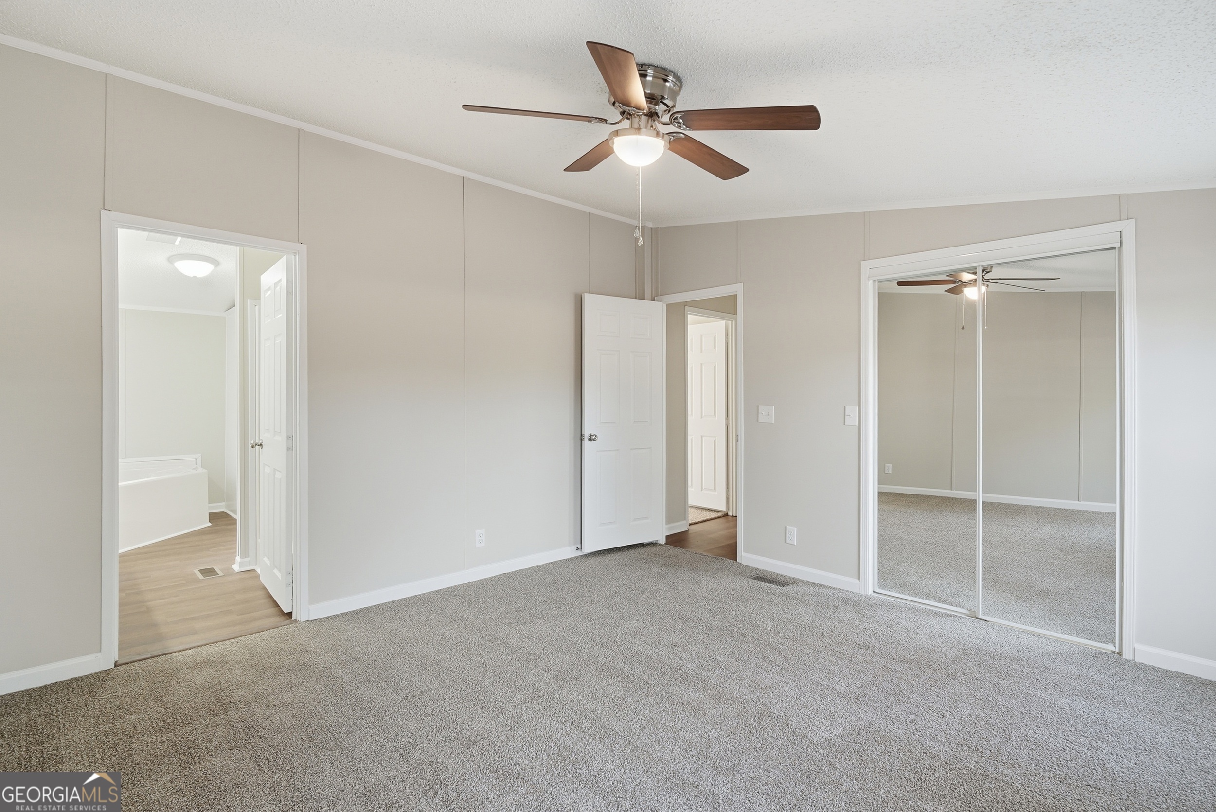 492 Doctortown Road Jesup, GA 31545 - Photo 13 of 25 a view of an empty room and closet area