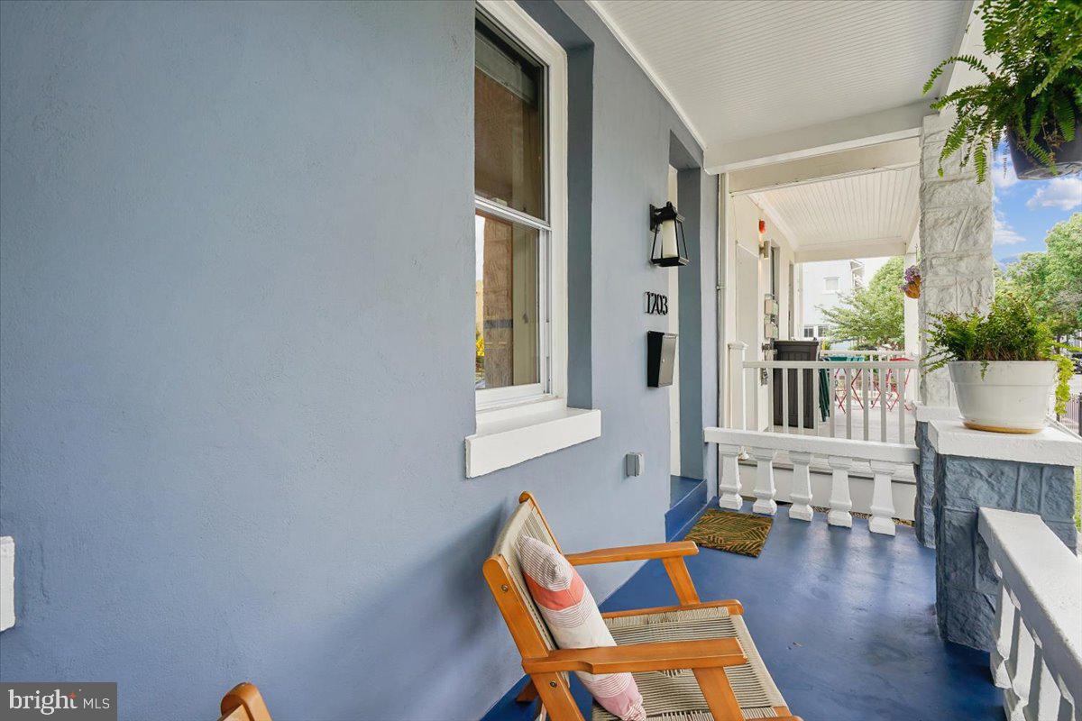 1203 Staples Street Northeast Washington, DC 20002 - Photo 49 of 51 Charming porch with inviting hues.