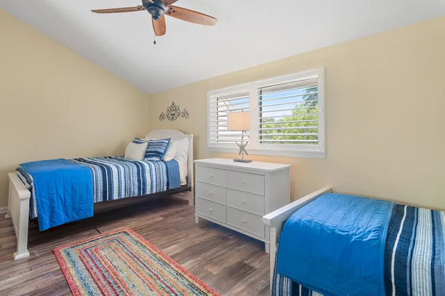 a room with a bed and a window