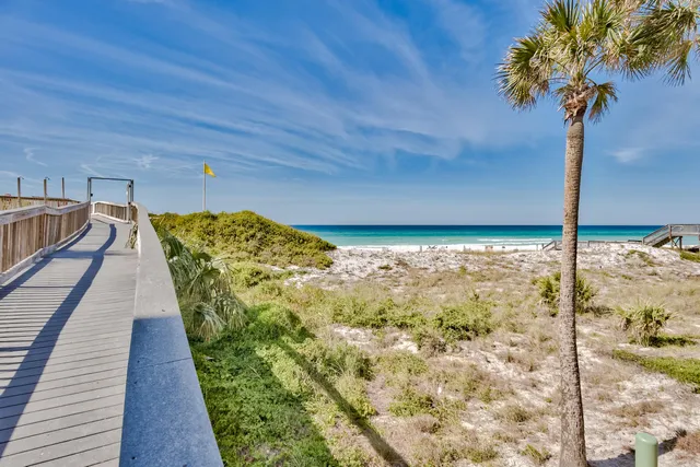 a view of a balcony with wooden floor