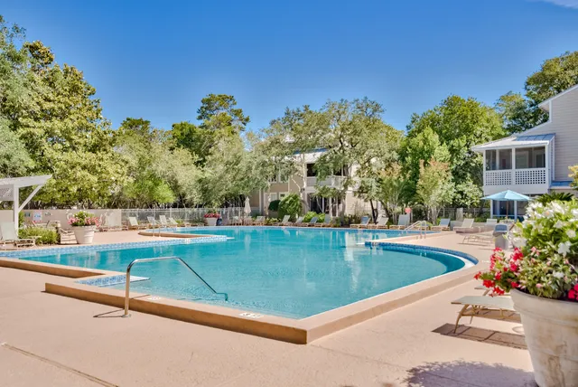 a view of a chairs and table in the patio