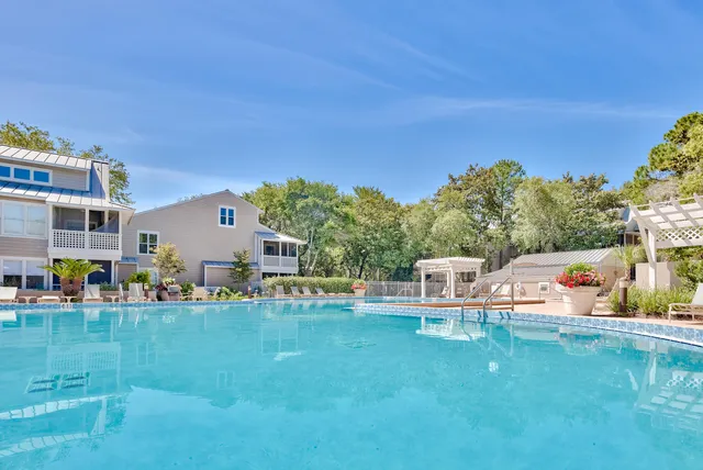 a view of a swimming pool with a patio