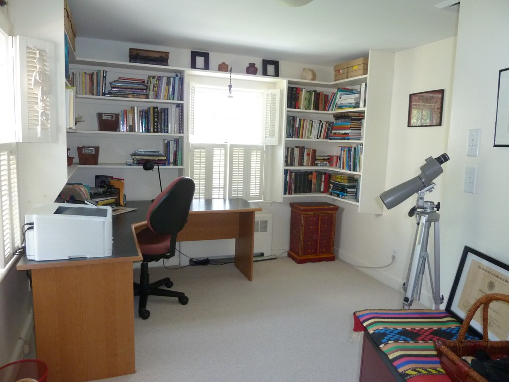 18 Glendale Road Marblehead, MA 01945 - Photo 15 of 29 a view of a workspace with furniture and a bookshelf