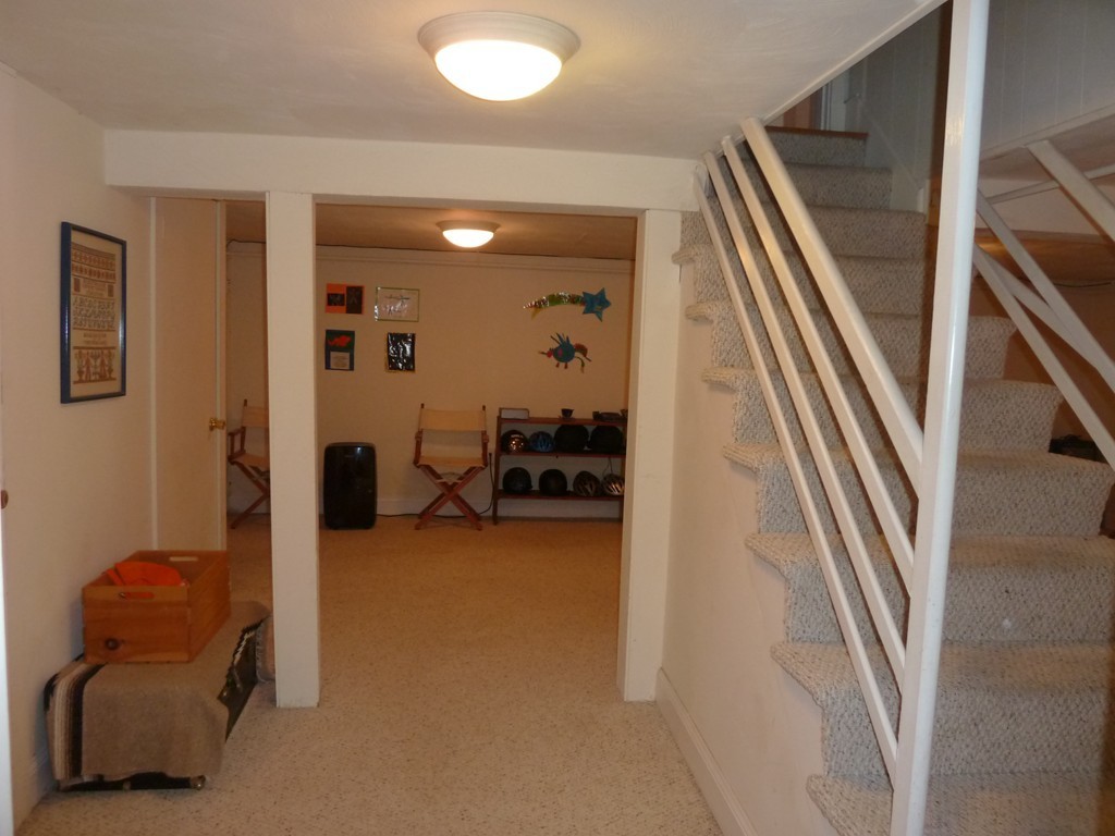 18 Glendale Road Marblehead, MA 01945 - Photo 26 of 29 a view of a livingroom with furniture and stairs