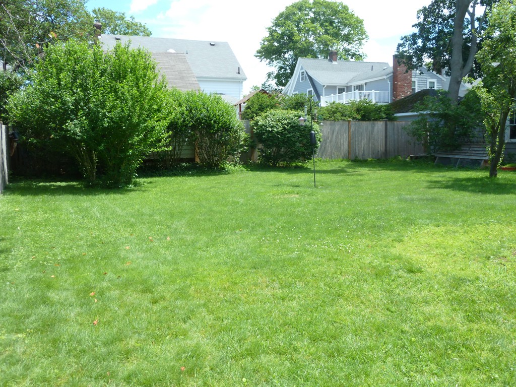 18 Glendale Road Marblehead, MA 01945 - Photo 28 of 29 a view of a backyard with a garden