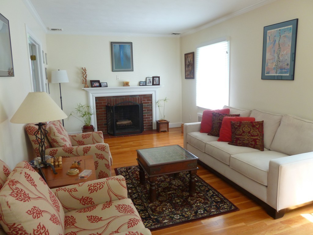 18 Glendale Road Marblehead, MA 01945 - Photo 3 of 29 a living room with furniture and a fireplace