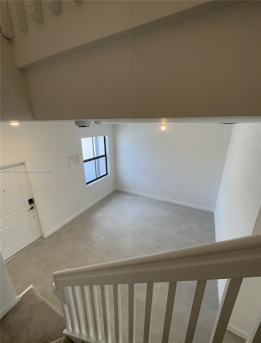 Miami-Dade County Homestead, FL 33032 - Photo 21 of 30 a view of an empty room and a window