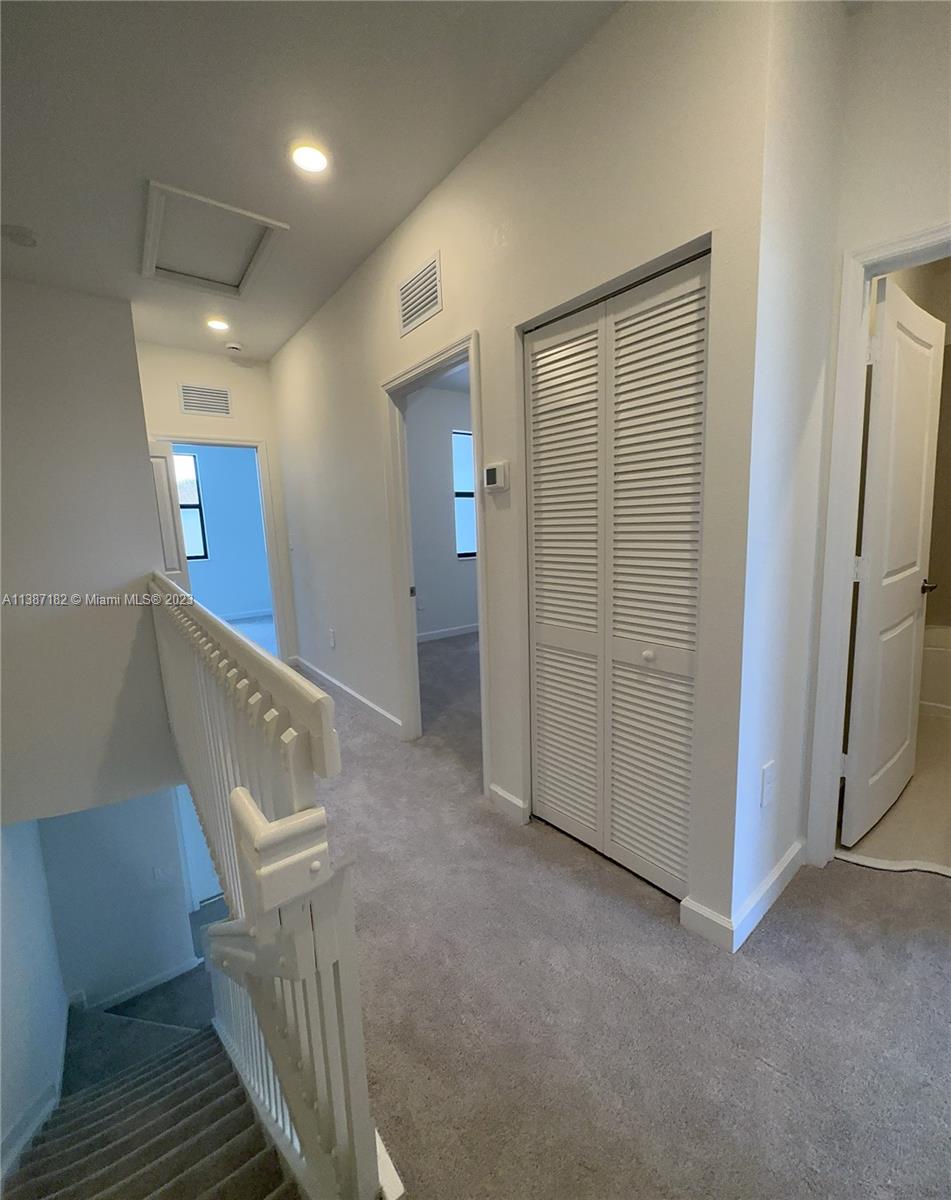 Miami-Dade County Homestead, FL 33032 - Photo 22 of 30 a view of a hallway with entryway