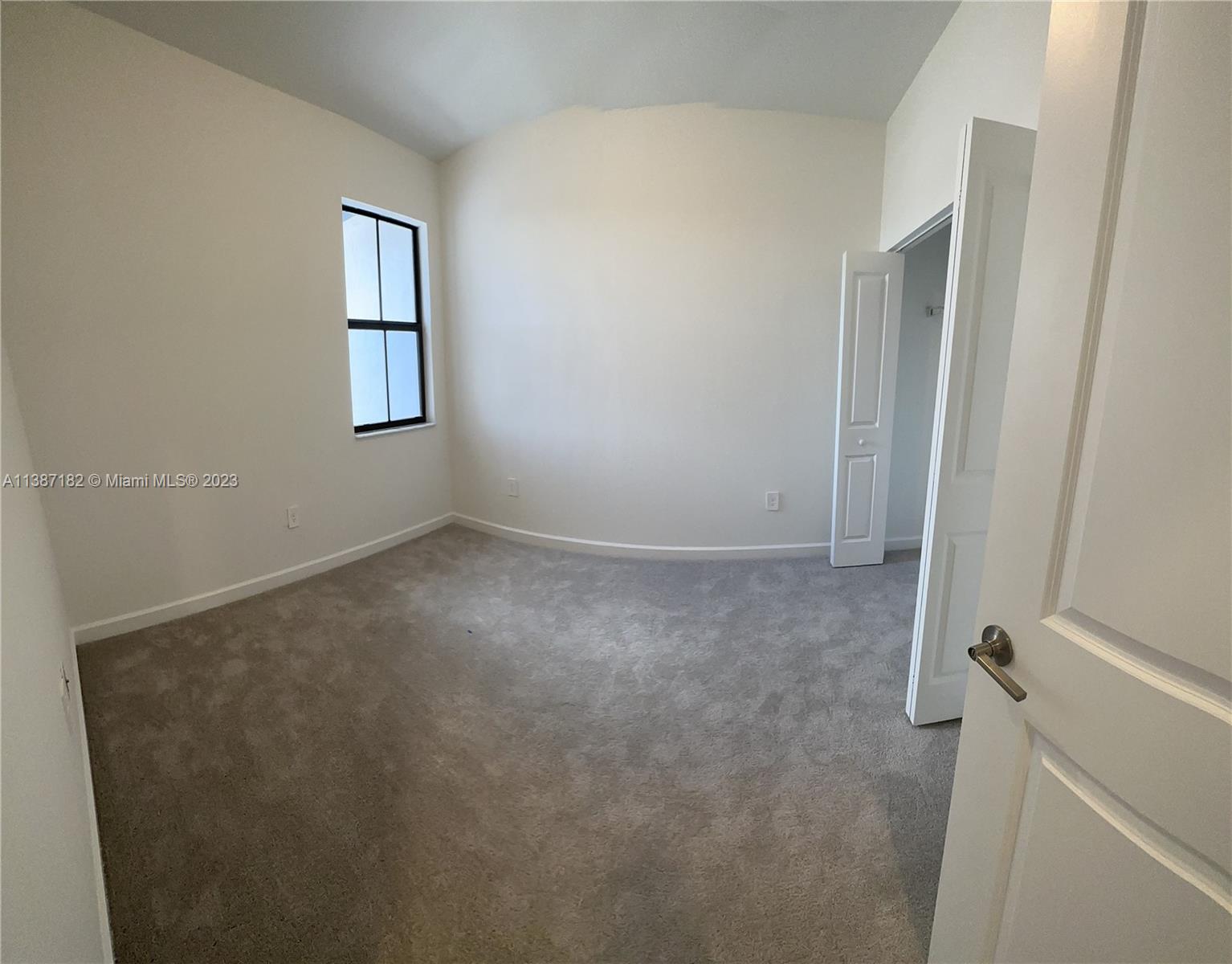 Miami-Dade County Homestead, FL 33032 - Photo 24 of 30 an empty room with windows