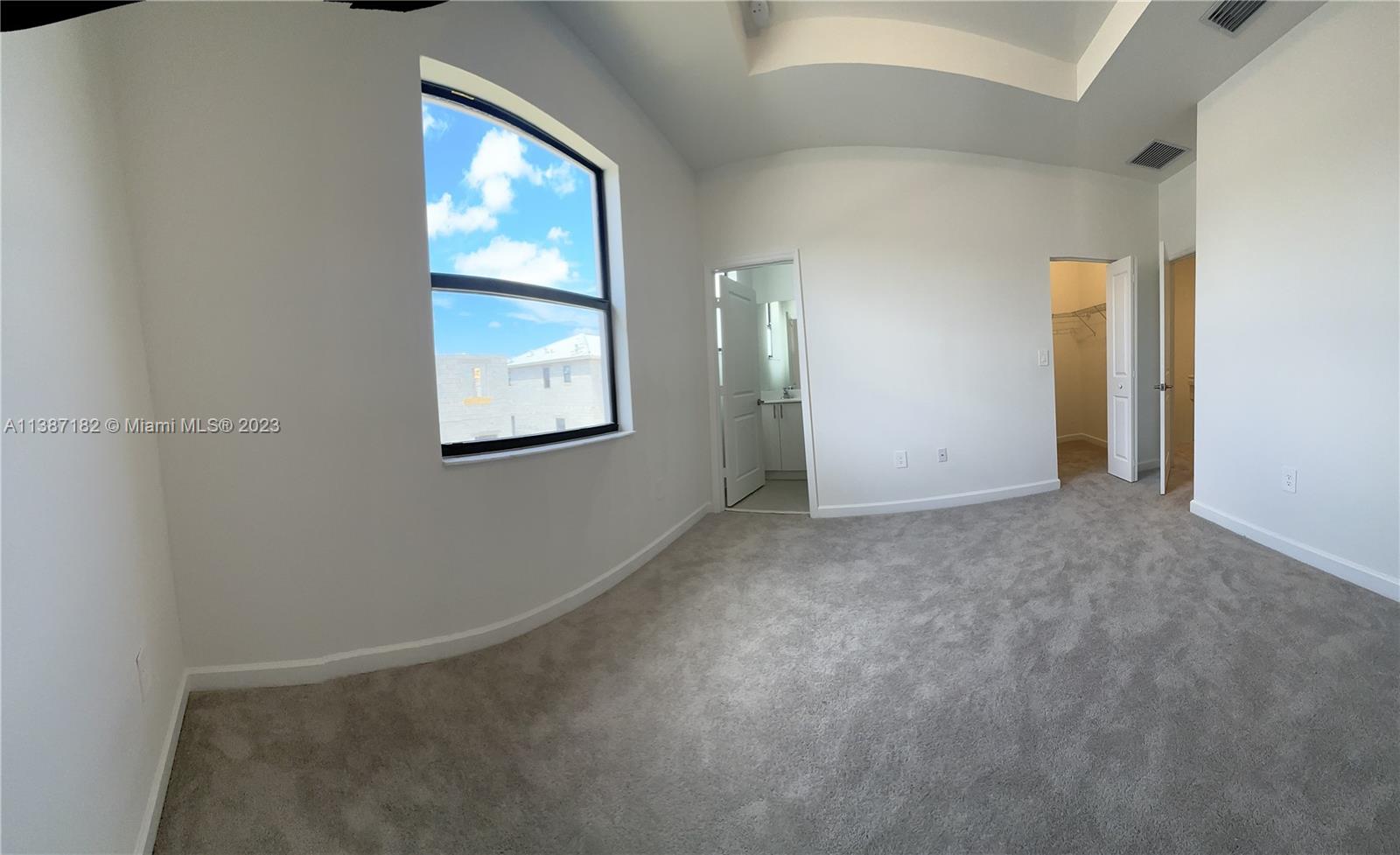 Miami-Dade County Homestead, FL 33032 - Photo 26 of 30 an empty room with windows and closet