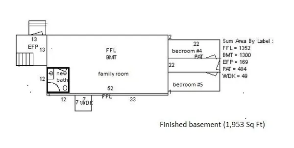 a bathroom with a sink and mirror with toilet