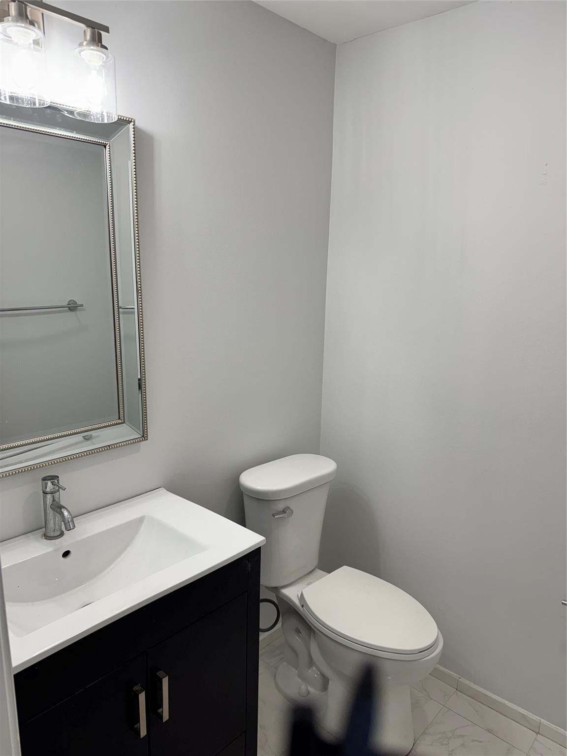 8201 Northwest 198th Street Hialeah, FL 33015 - Photo 11 of 23 a bathroom with a sink and a toilet