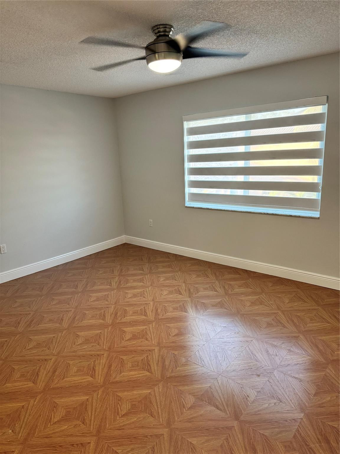 8201 Northwest 198th Street Hialeah, FL 33015 - Photo 16 of 23 a view of an empty room with a window