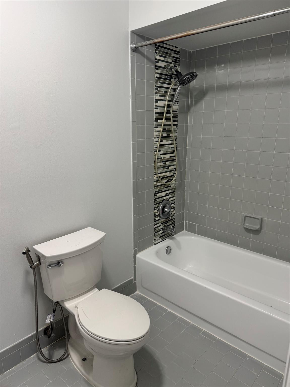 8201 Northwest 198th Street Hialeah, FL 33015 - Photo 17 of 23 a bathroom with a toilet and a bathtub