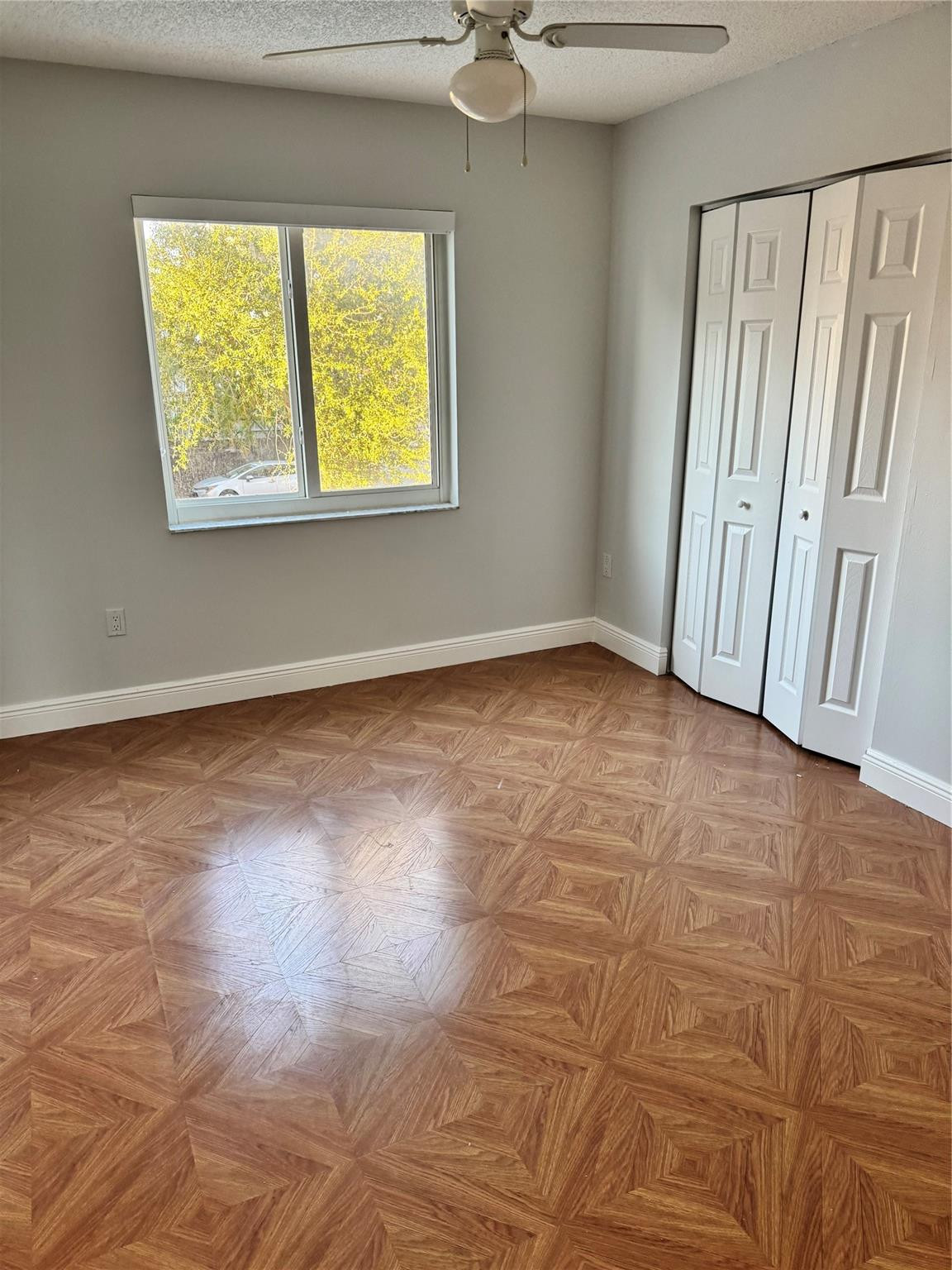 8201 Northwest 198th Street Hialeah, FL 33015 - Photo 18 of 23 a view of an empty room with a window