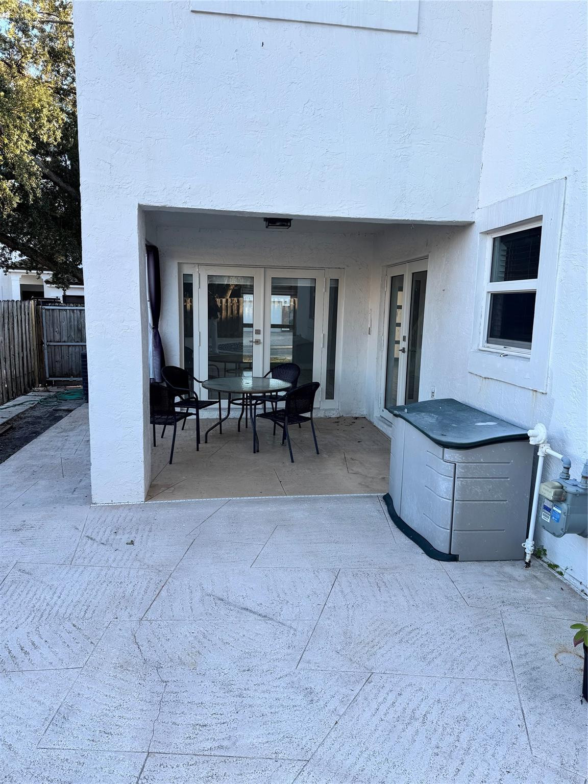 8201 Northwest 198th Street Hialeah, FL 33015 - Photo 23 of 23 a living room with furniture and a flat screen tv
