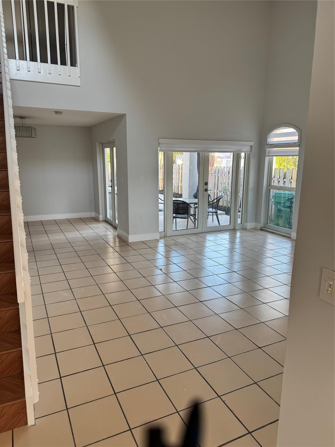 8201 Northwest 198th Street Hialeah, FL 33015 - Photo 4 of 23 a view of empty room with window and wooden floor
