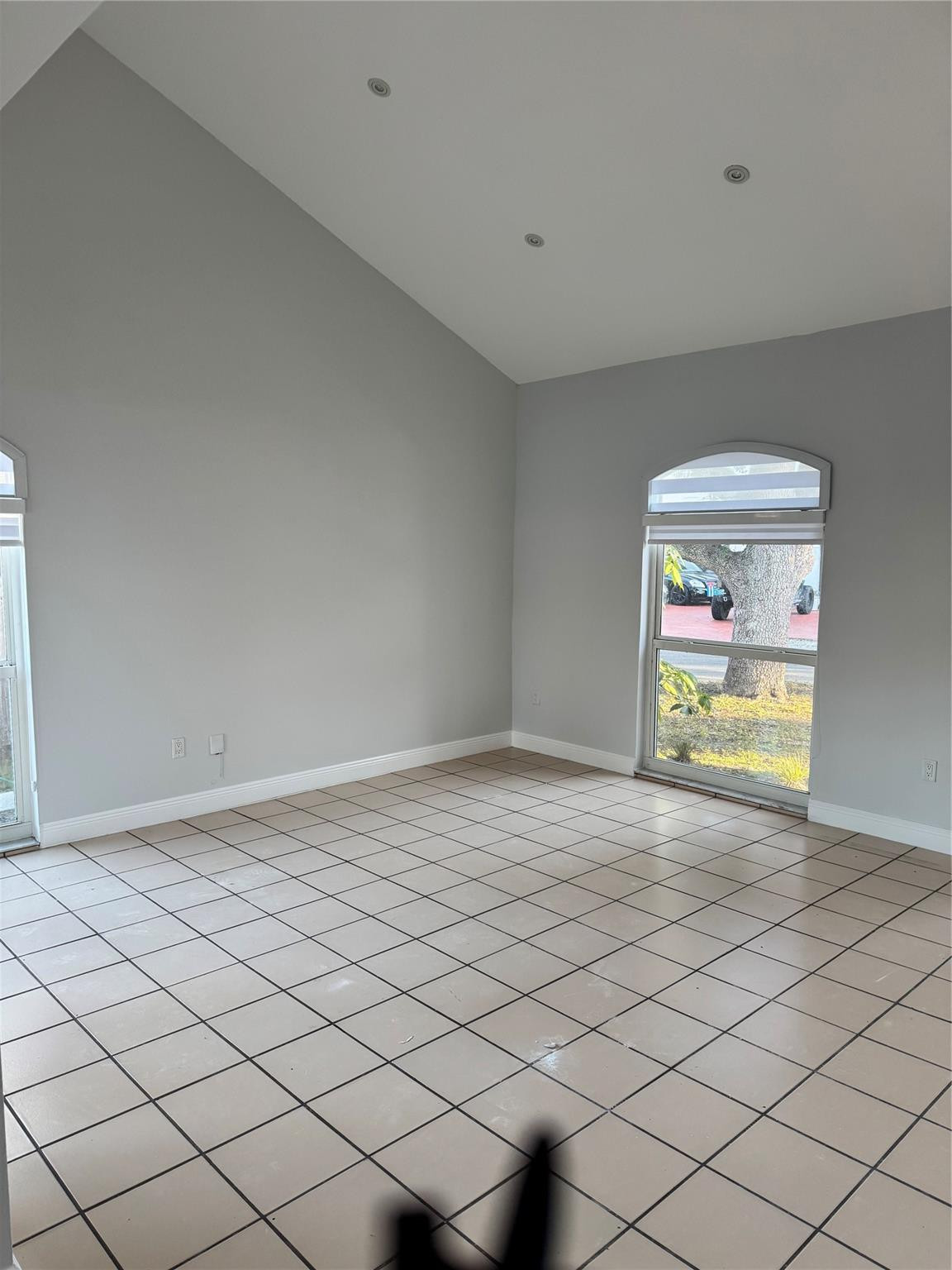8201 Northwest 198th Street Hialeah, FL 33015 - Photo 5 of 23 a view of an empty room and a window