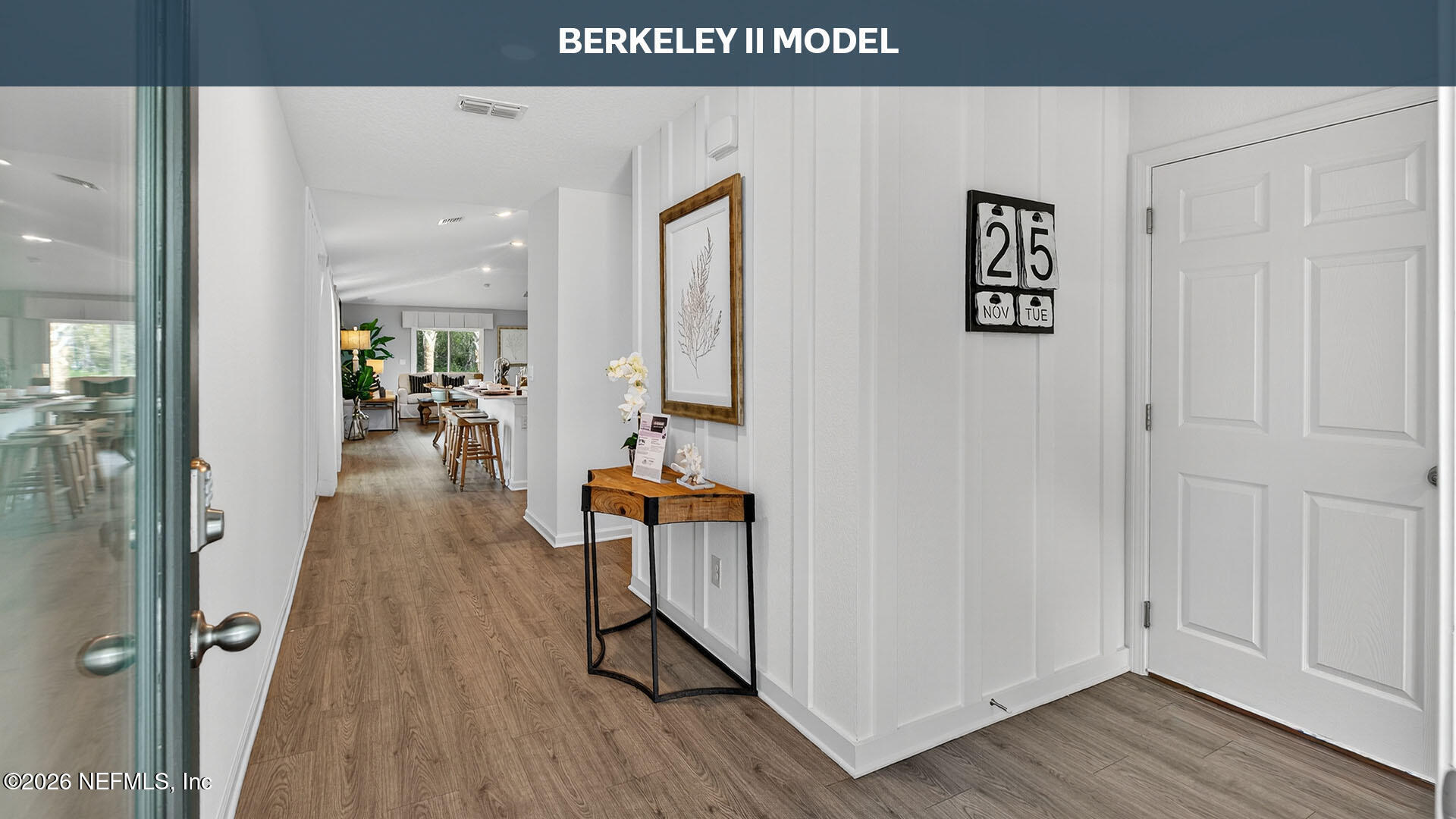 12396 Russian Olive Road Jacksonville, FL 32218 - Photo 4 of 52 wooden floor in a hall with an entryway