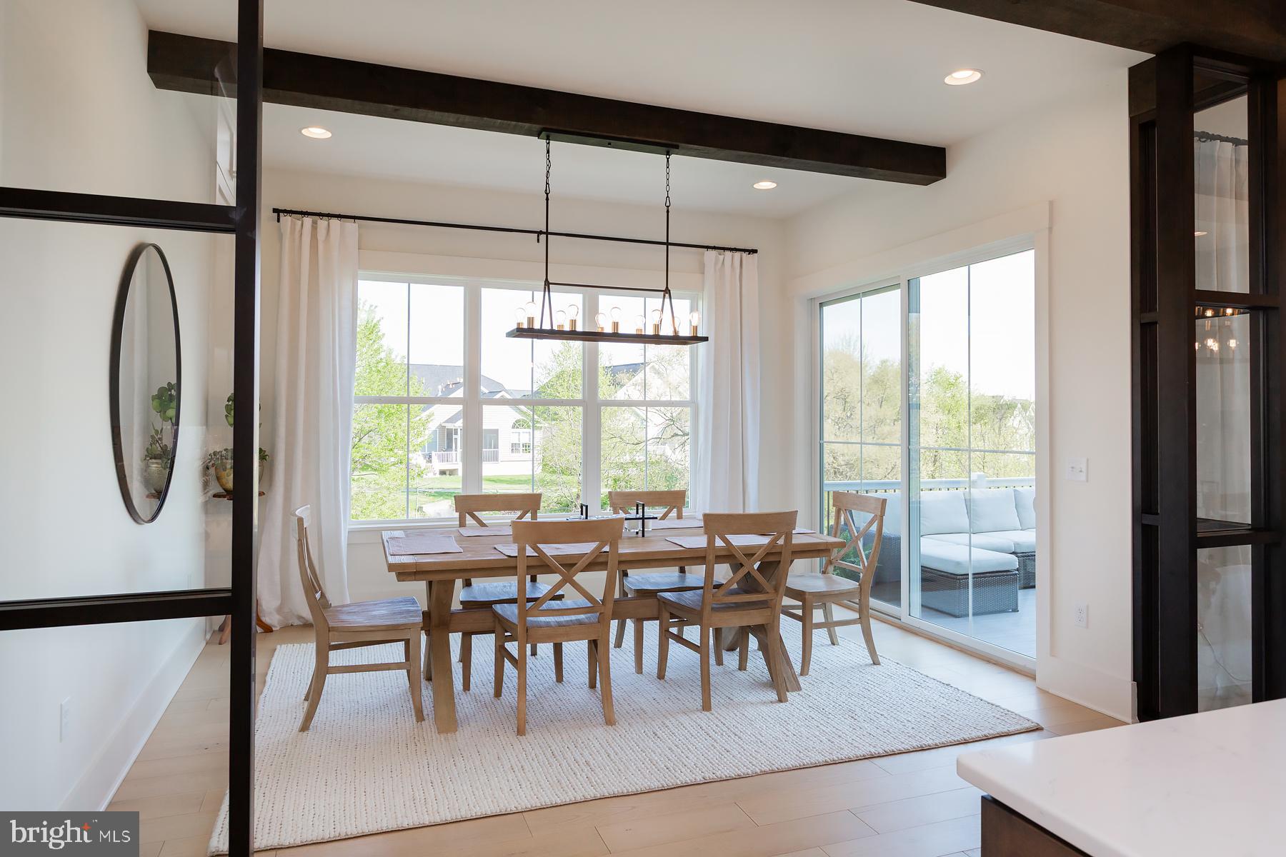 1016 Valley Crossing Drive Lititz, PA 17543 - Photo 5 of 85 a view of a dining room with furniture window and outside view